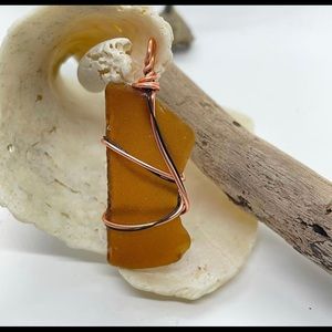 Brown wire wrapped seaglass